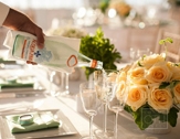 yellow and green table setting with roses